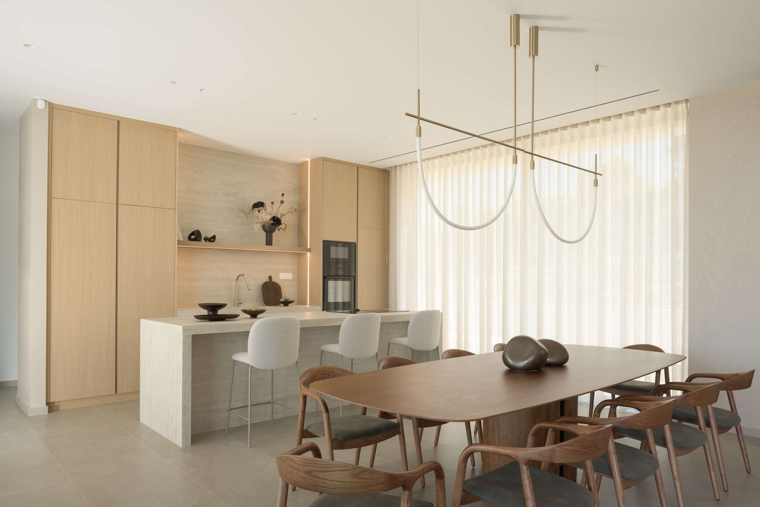 Clean island design, local textures, and practical elegance make the kitchen & dining ideal for shared meals and family moments. Clean island design, local textures, and practical elegance make the kitchen & dining ideal for shared meals and family moments.
